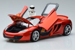 McLaren MP4-12C Mit Stig Top Gear Figur Minichamps 1:18 519101330 Metall – Bild 2 von 7