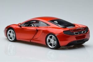 McLaren MP4-12C Mit Stig Top Gear Figur Minichamps 1:18 519101330 Metall – Bild 6 von 7