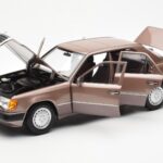 Mercedes 230E W124 Rosewood Metallic Händler Edition Norev 1:18 - image 2 of 8