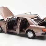 Mercedes 230E W124 Rosewood Metallic Händler Edition Norev 1:18 - image 5 of 8