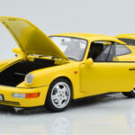 Porsche 911 964 Carrera 2 Gelb Norev 1:18 - image 2 of 8