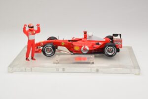 Ferrari F2004 #1 M. Schumacher F1 World Champion 2004 Mit Rennanzug Hot Wheels 1:18 B66221 Metall – Bild 3 von 6